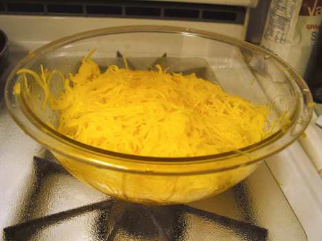 Just half of a microwaved spaghetti squash makes 5 or 6 cups