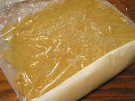 rolling cut ravioli sheets for storage in the fridge