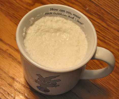 Reconstitute coconut shreds in milk by microwaving a minute or two