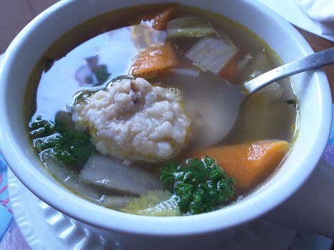 Microwave matzah ball in vegetarian not-chicken soup